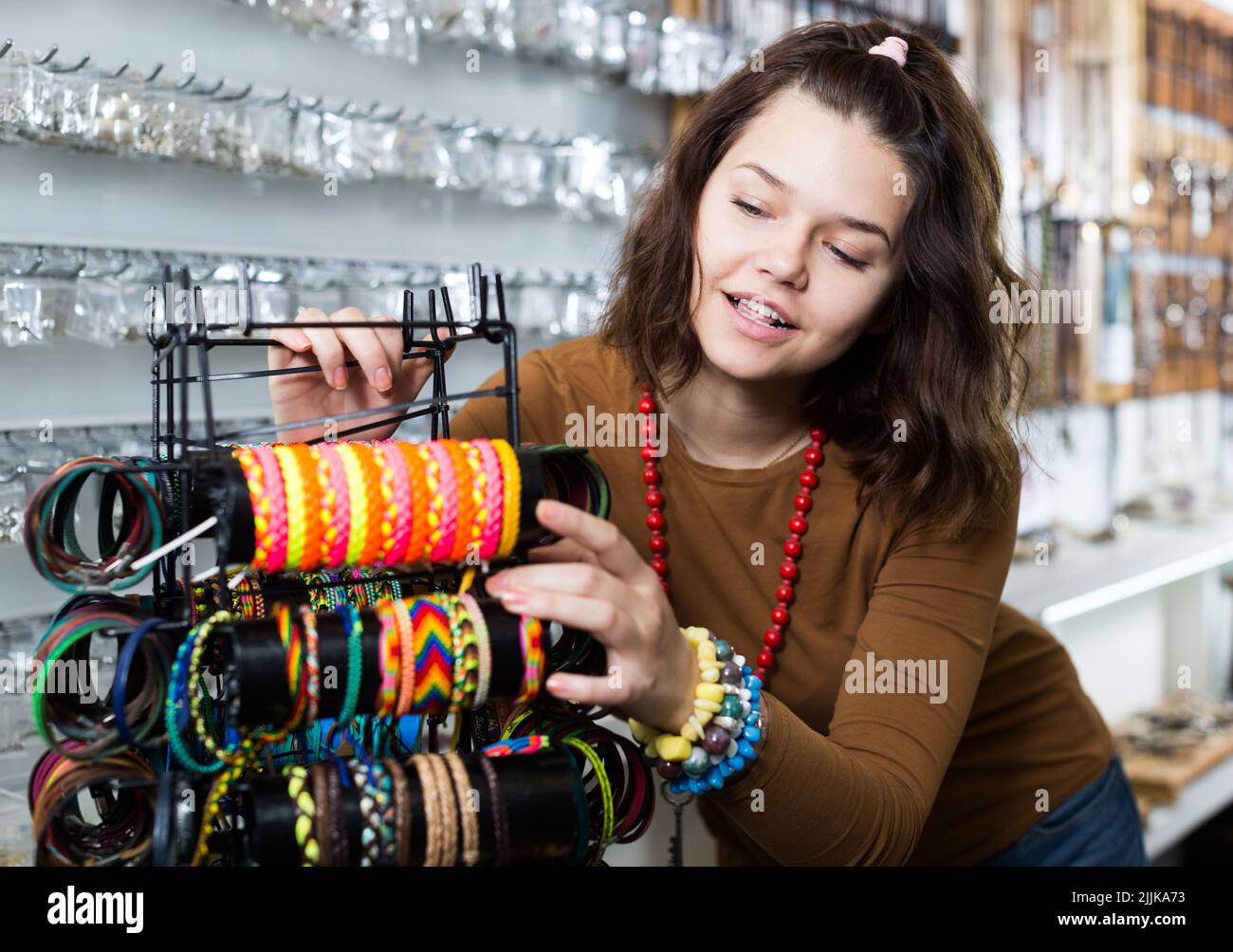 Bracelets gold leather hi-res stock photography and images - Alamy