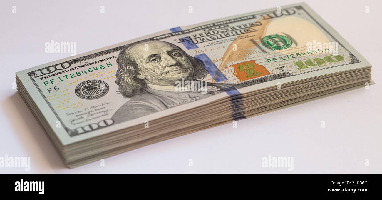 Pile of 100 dollar banknotes on white background for design purpose ...