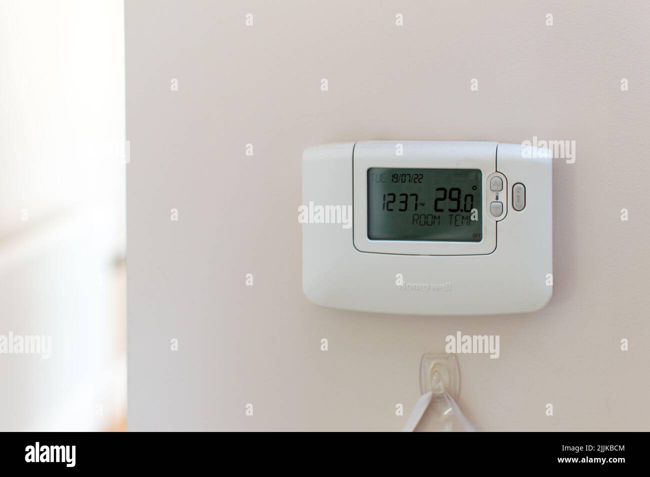 Home thermostat showing 29 degree celcius temperature Stock Photo