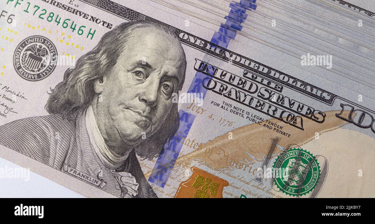 Pile of 100 dollar banknotes on white background for design purpose ...
