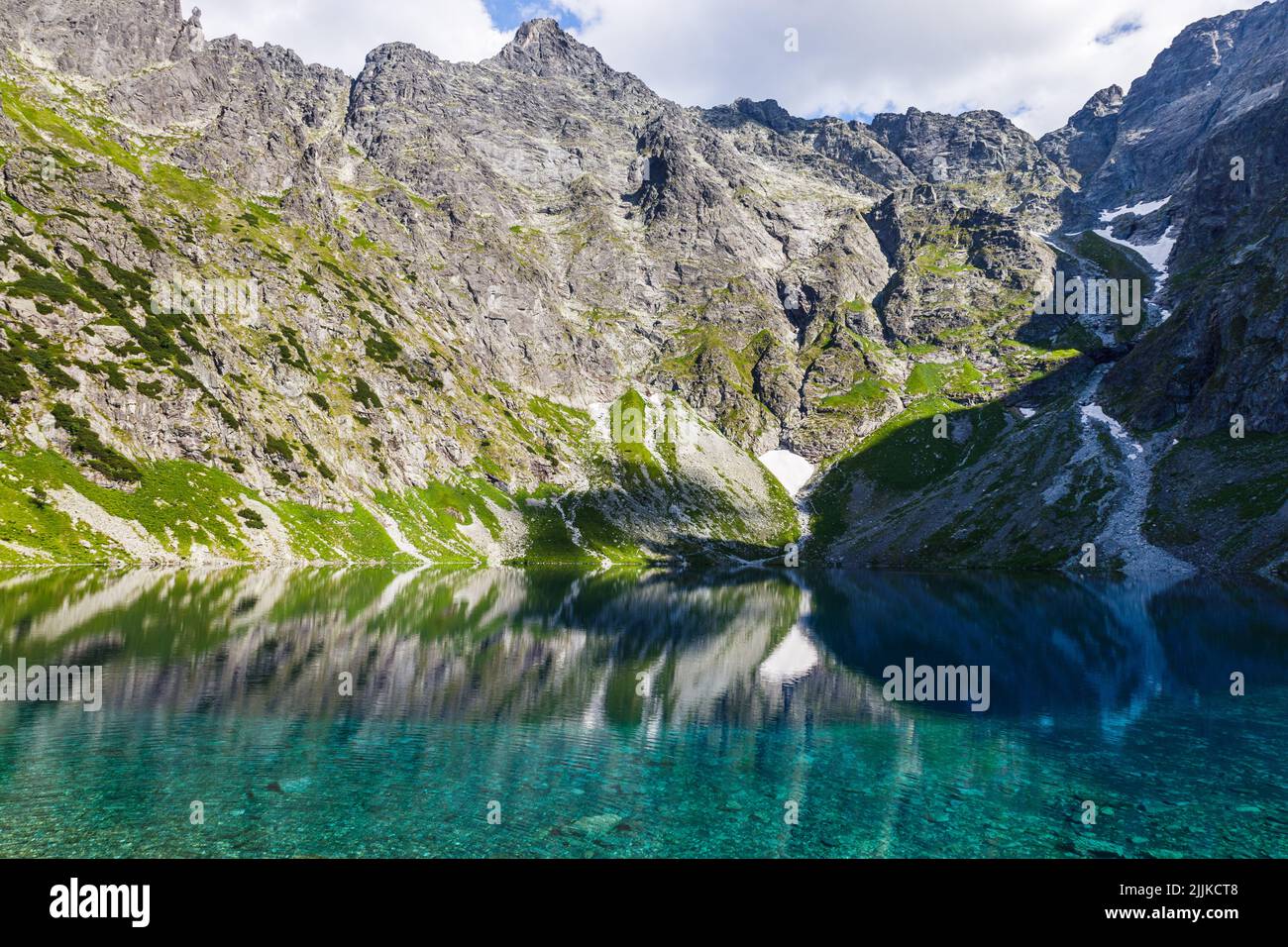 Black Lake is a mountain lake on the Polish side of Mount Rysy in the Tatra mountains Stock Photo