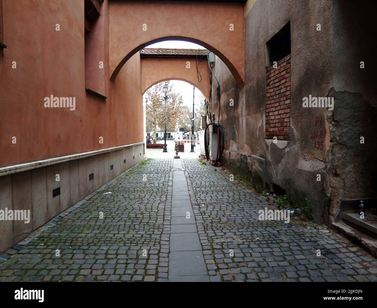 A narrow alley in Baia Mare city, Romania Stock Photo