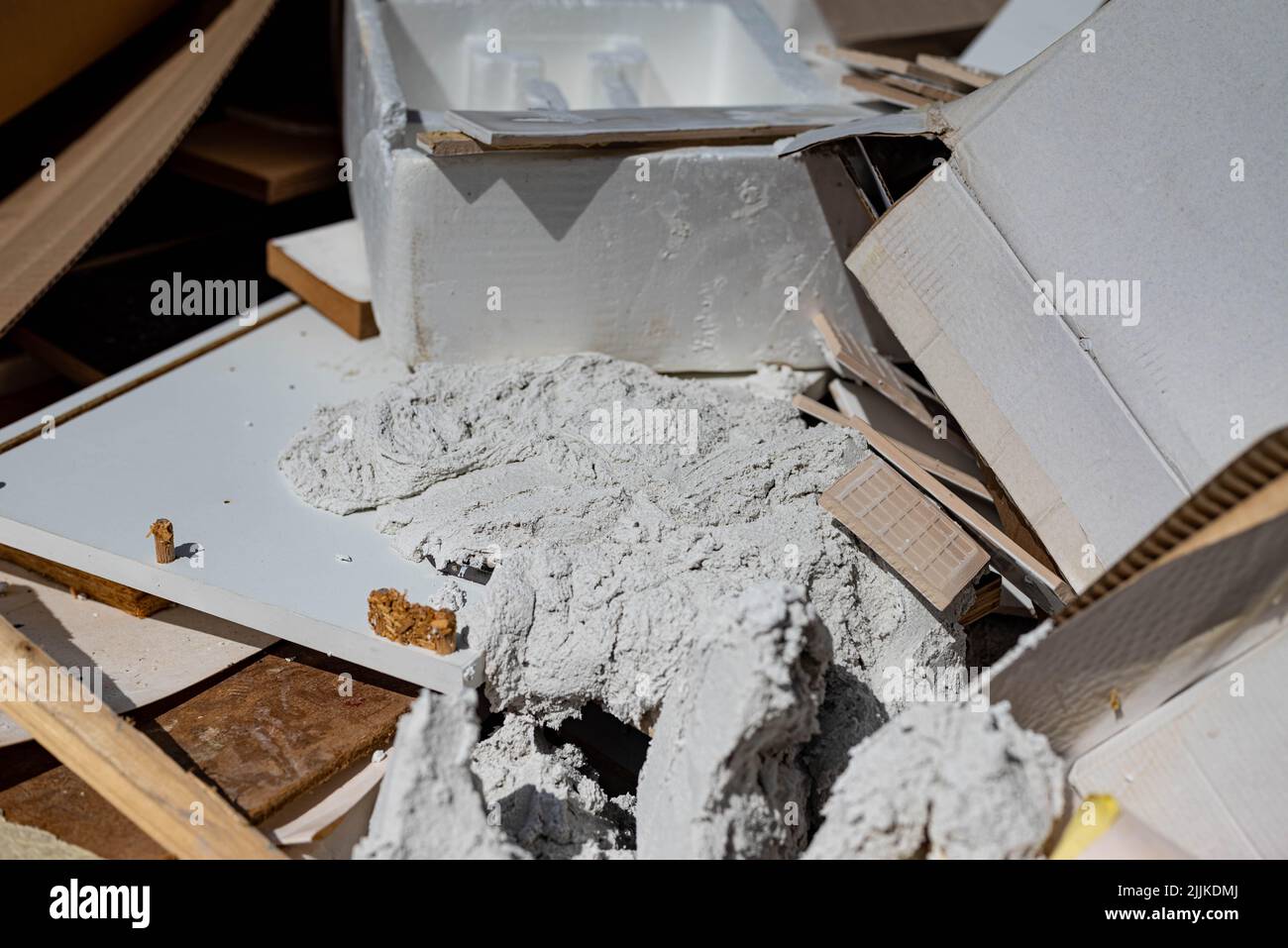 Diverse waste in a container for waste during or after a renovation. There are no trademarks or people in the shot. Stock Photo