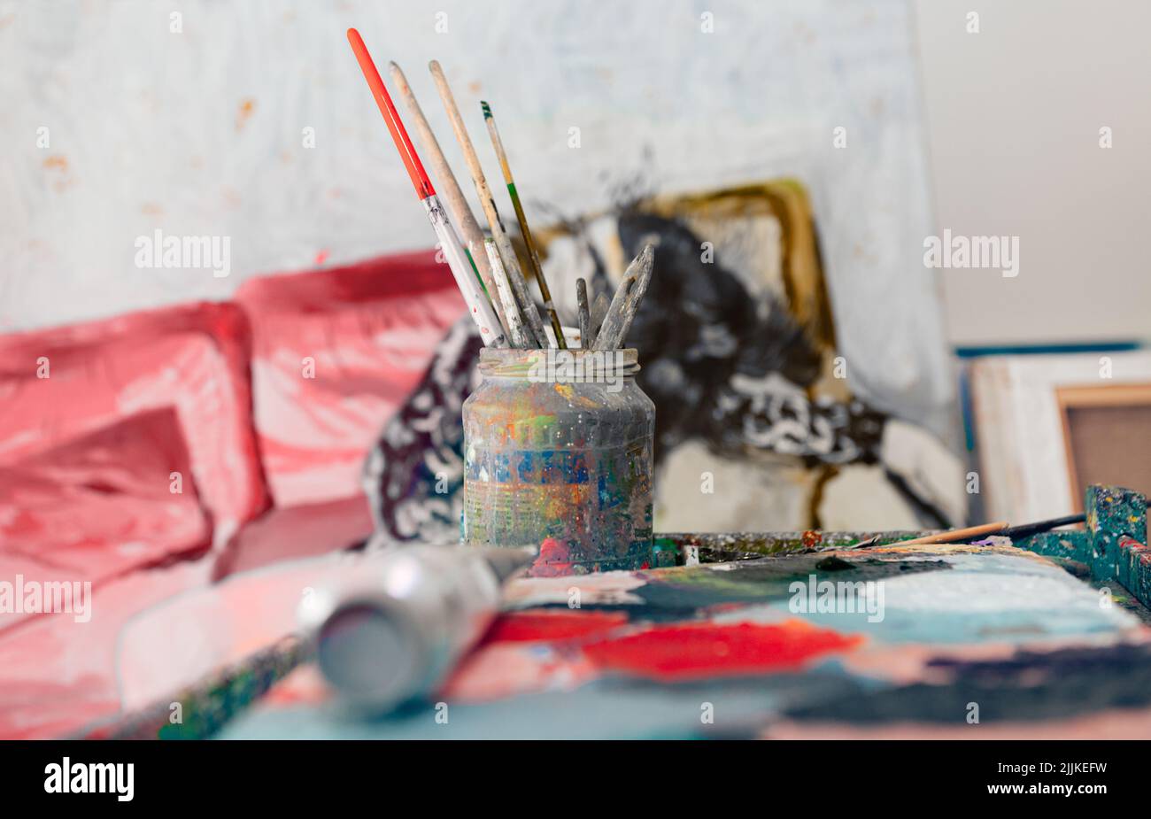 A closeup of painter workplace indoor at workshop atelier studio Stock Photo