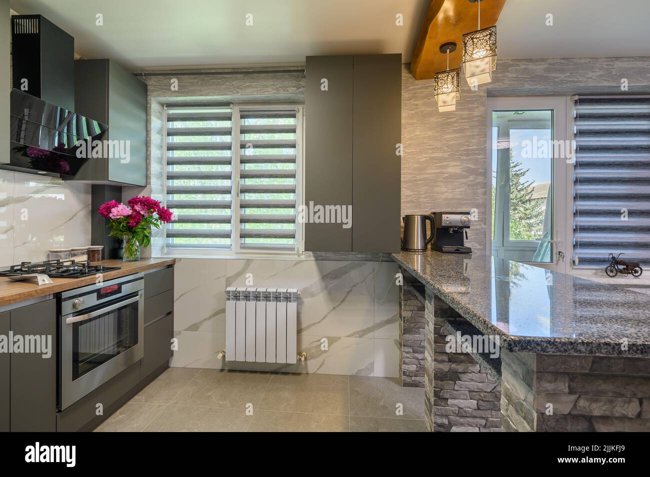 Interior of modern trendy grey kitchen Stock Photo - Alamy