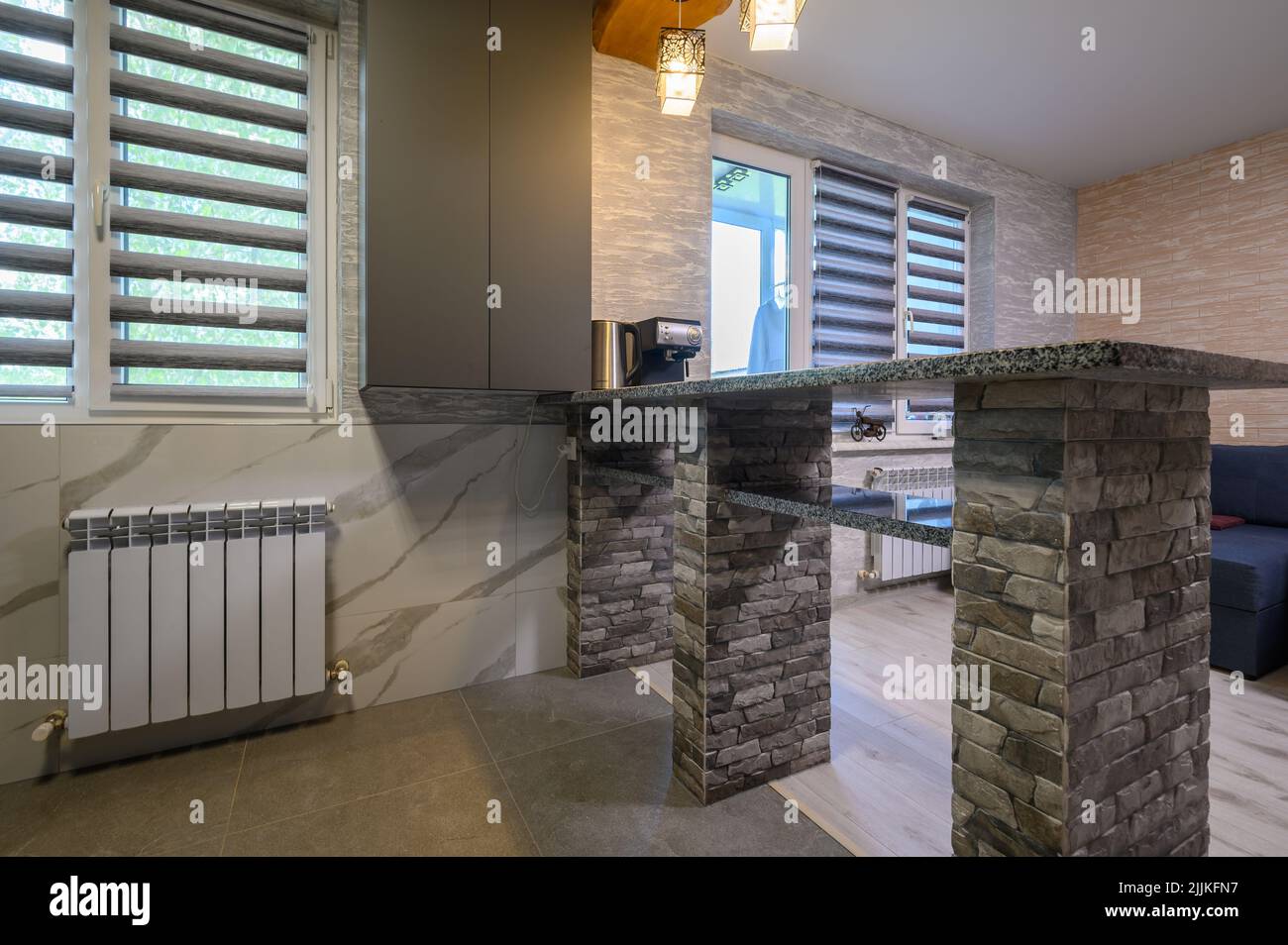 Interior of modern trendy grey kitchen Stock Photo - Alamy