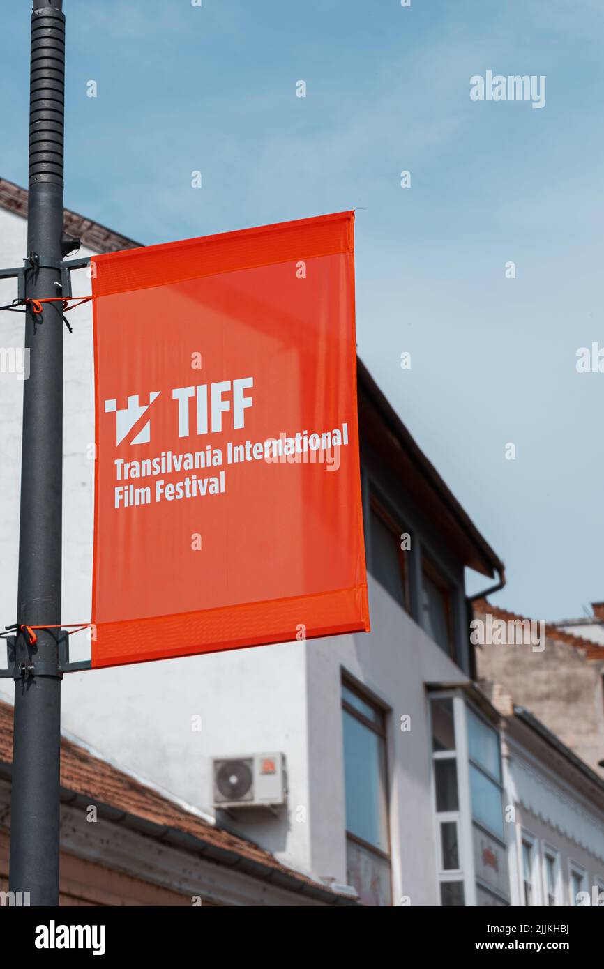 A vertical shot of the Transilvania International Film Festival sign in the city street Stock Photo