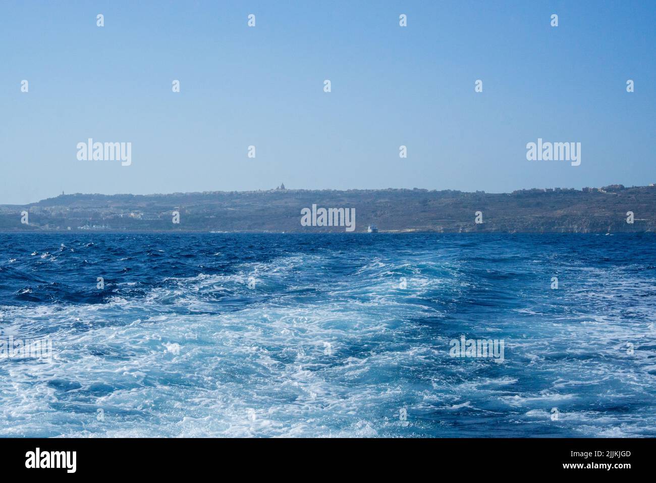 A natural view of a sea from a boat on the Blue Lagoon in Comino Island Malta Stock Photo