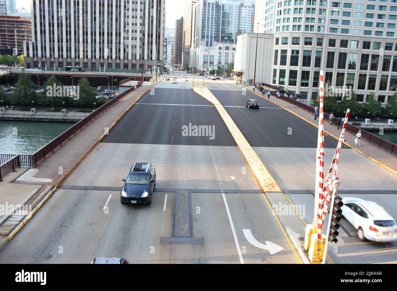An aerial view of cars on a road with many lanes in downtown Chicago