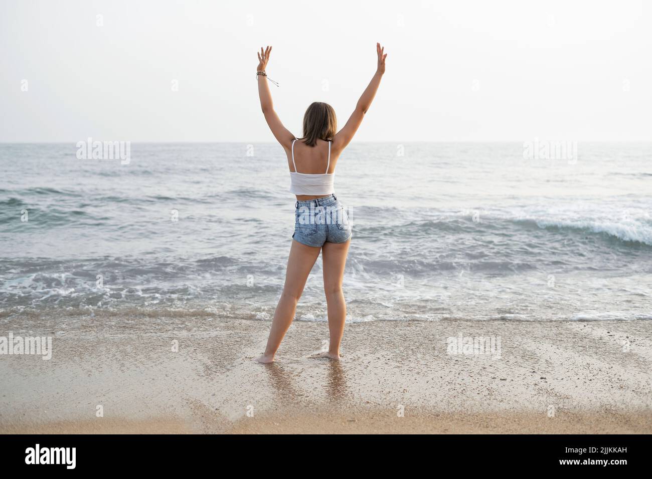 Model looking at camera beach hi-res stock photography and images - Alamy