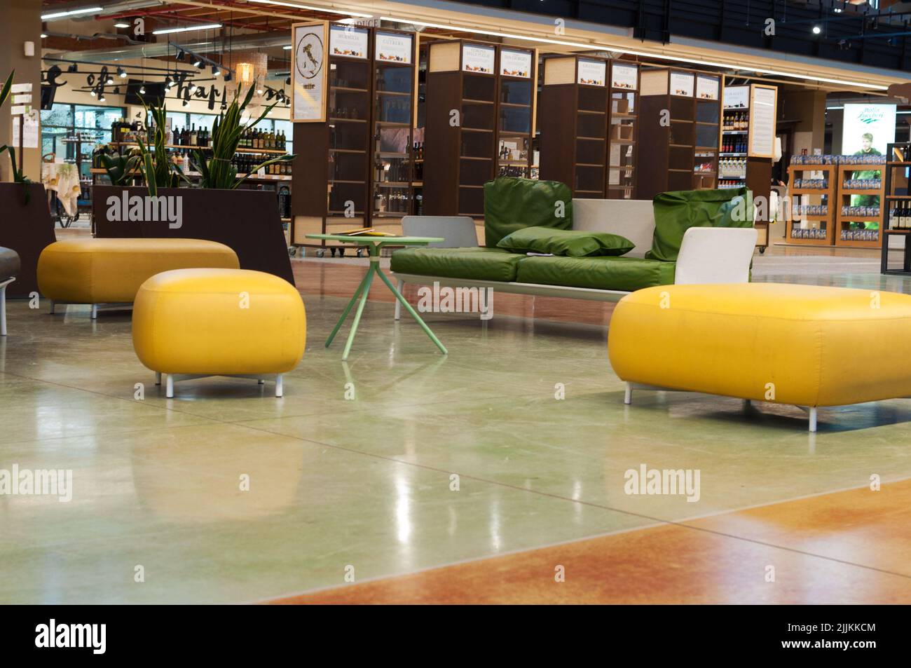 The interior of a building with yellow sofas Stock Photo
