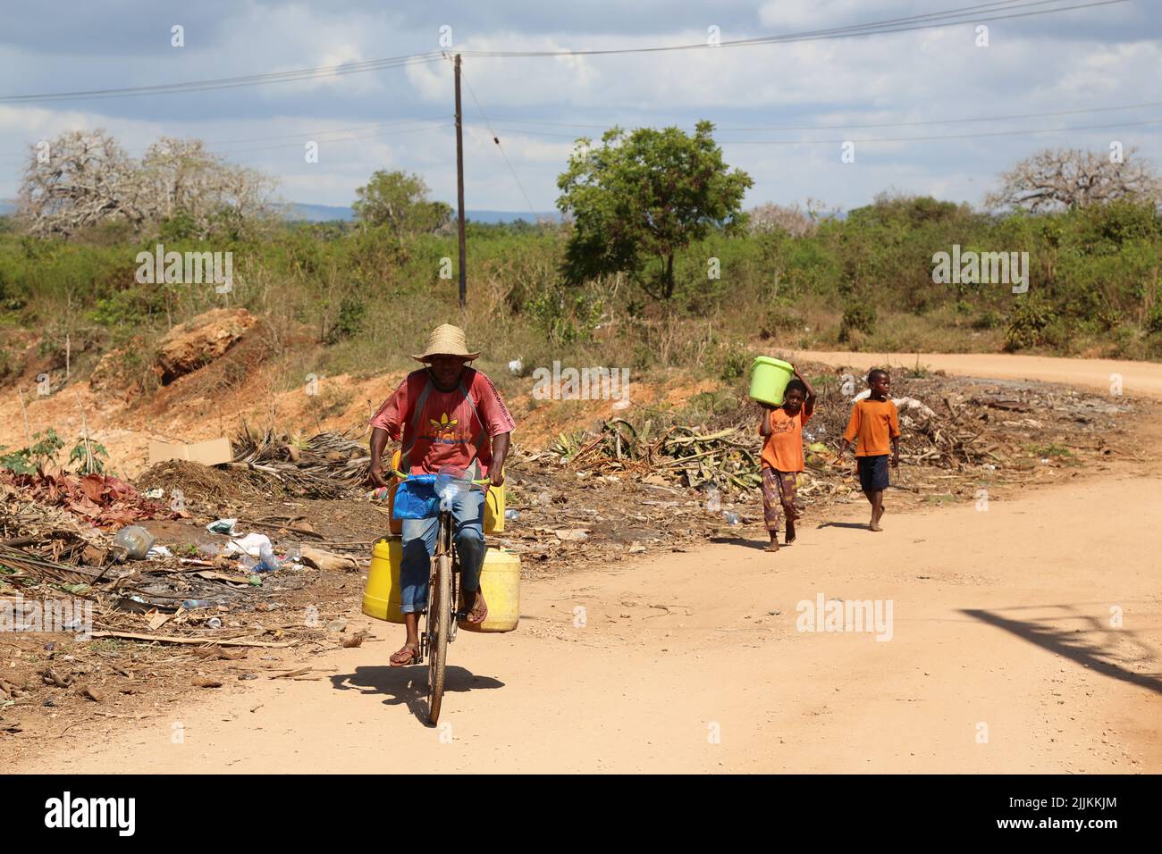 The local people carrying water with buckets in Ukunda, Kenya Stock