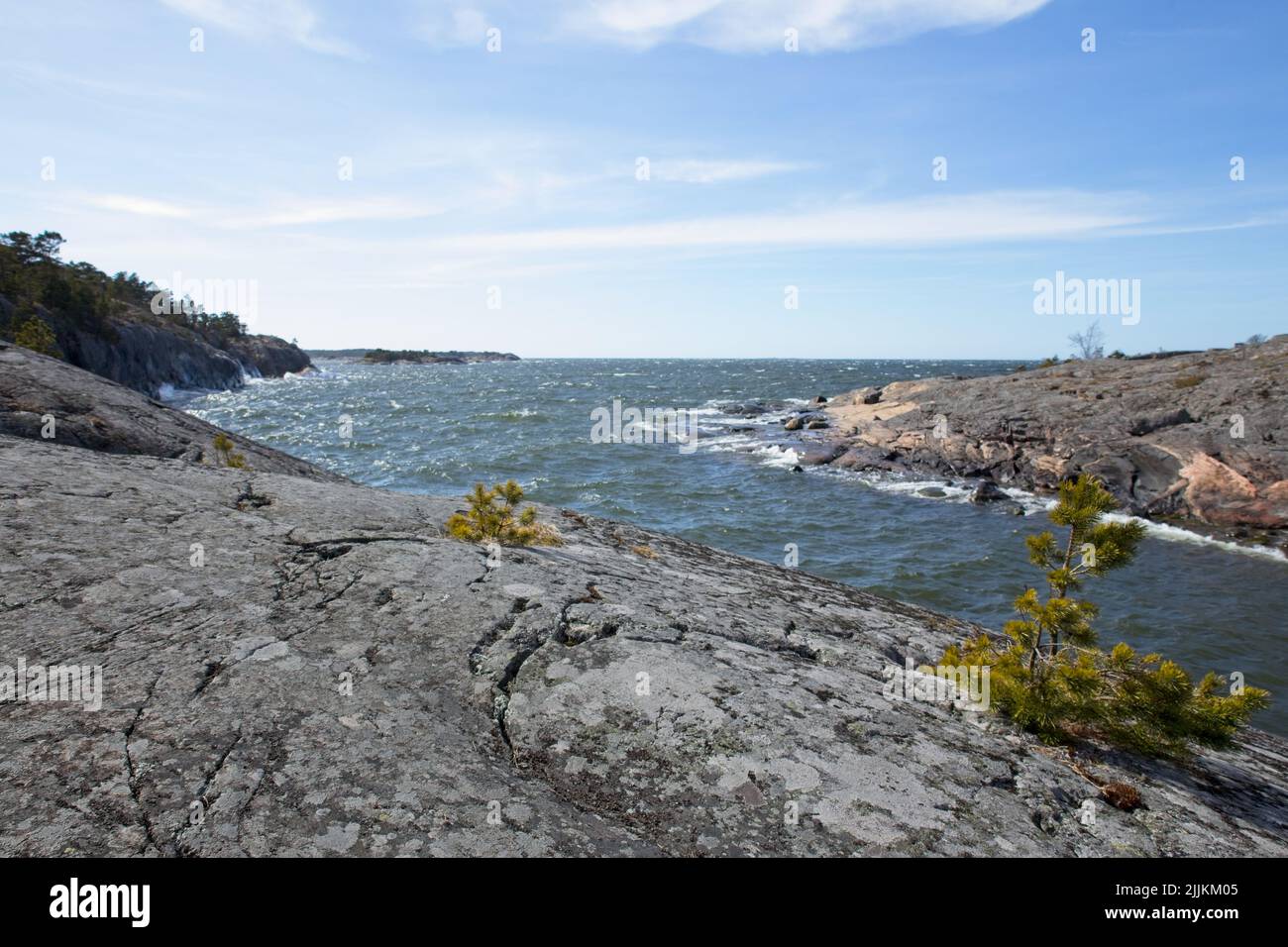 Rocky seashore on a sunny day in spring at Porkkala, Kirkkonummi, Finland. Stock Photo