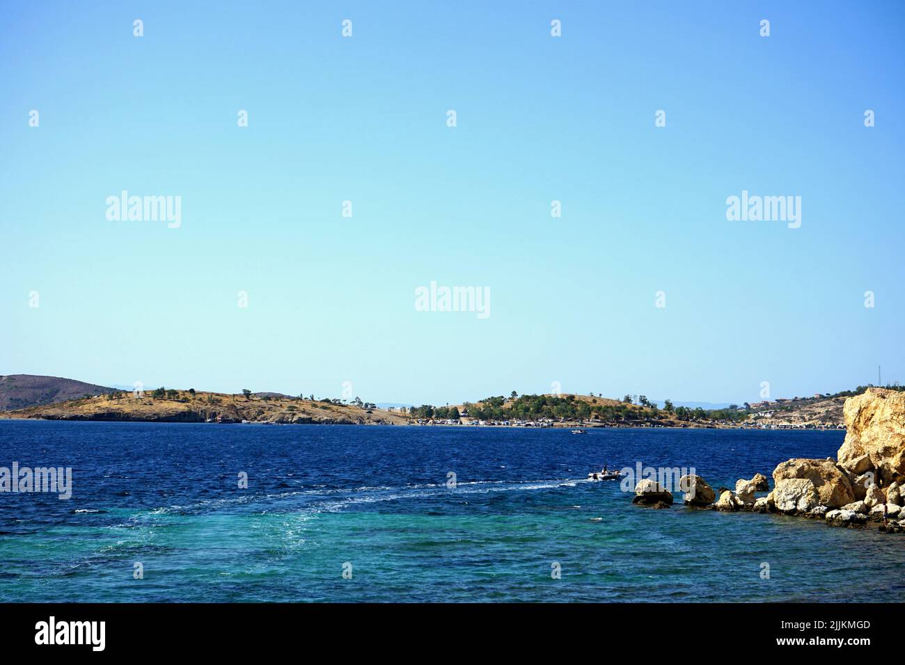 A beautiful shot of a seascape under the clear skies Stock Photo