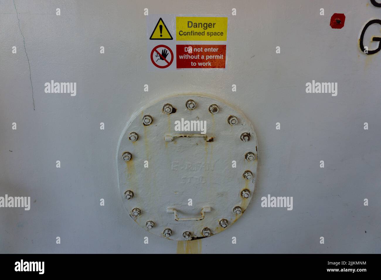 Entrance in to enclosed space. Tank lid. Closed tank lid. Enclosed