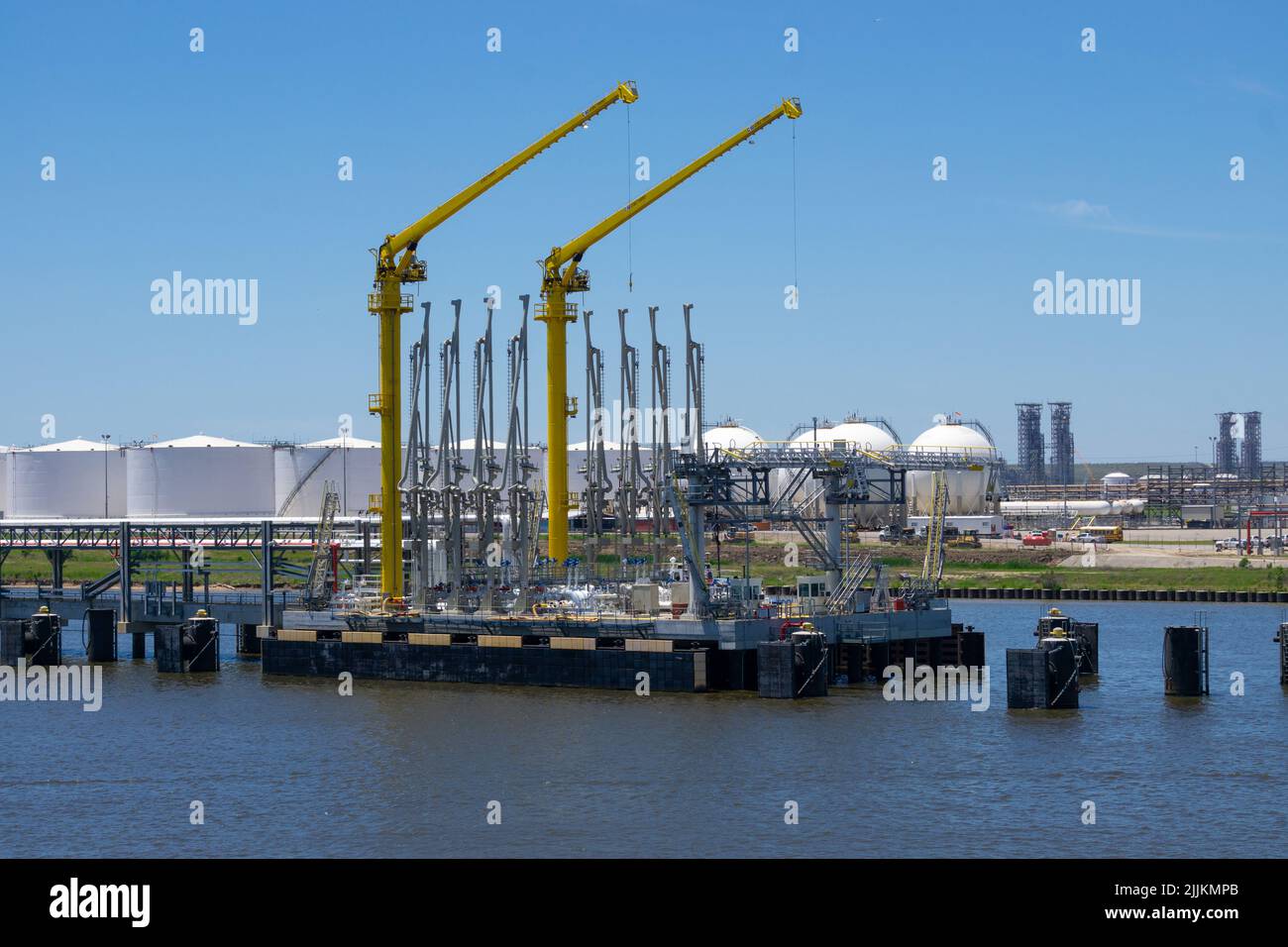 Port of Houston industrial oil, chemical storage tanks. Oil, Chemical terminal loading arms. Stock Photo
