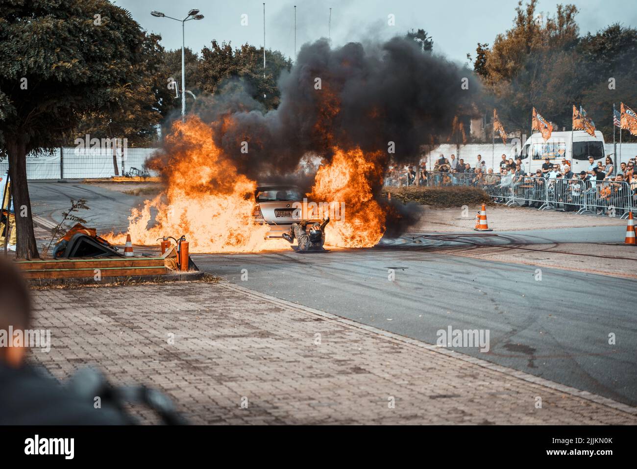 The car on fire at Lagrin's Action Sport Team show. Lohne, Germany. Stock Photo