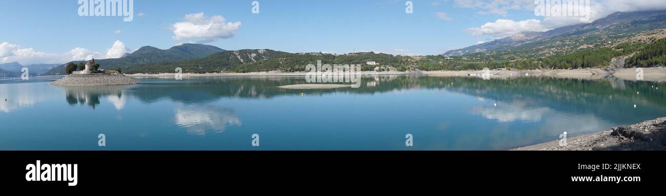 panoramic view of serre ponçon lake in the alps france Stock Photo