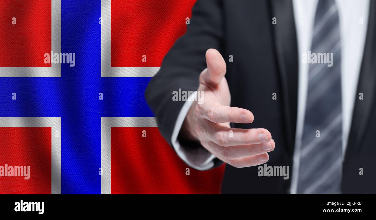 Norwegian business, politics, cooperation and travel concept. Hand on