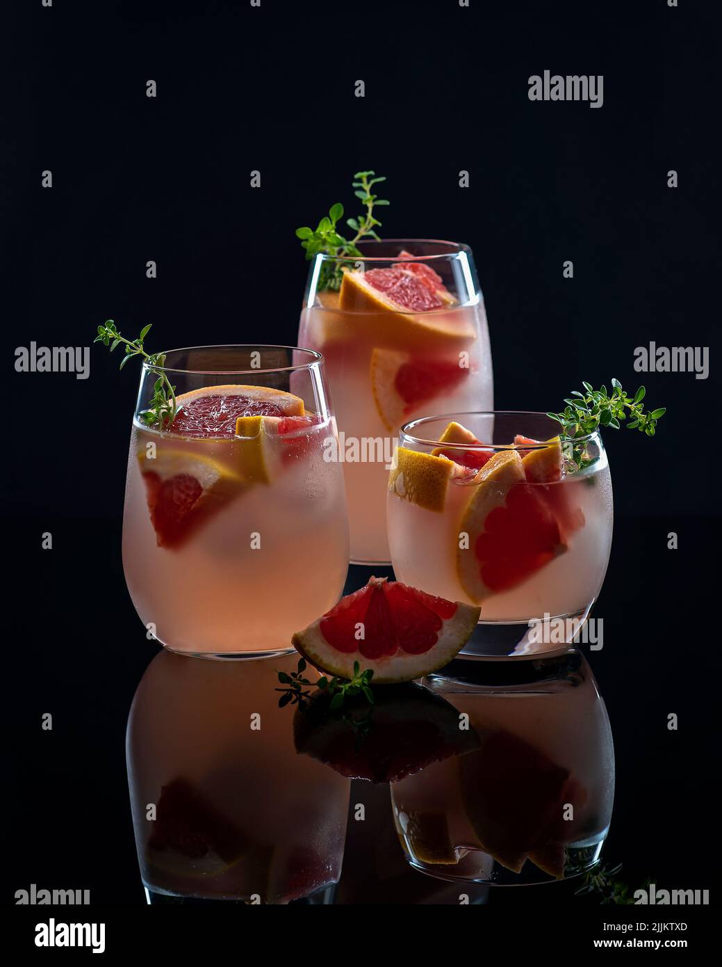 Photography of pink drink, grapefruit, lemonade, cocktail, thyme Stock