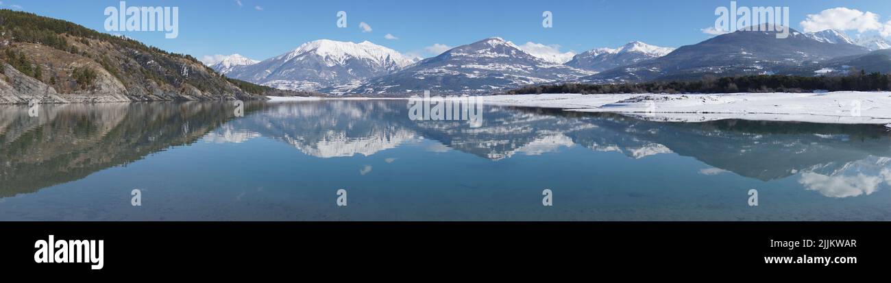 panoramic view of serre ponçon lake in the alps france Stock Photo