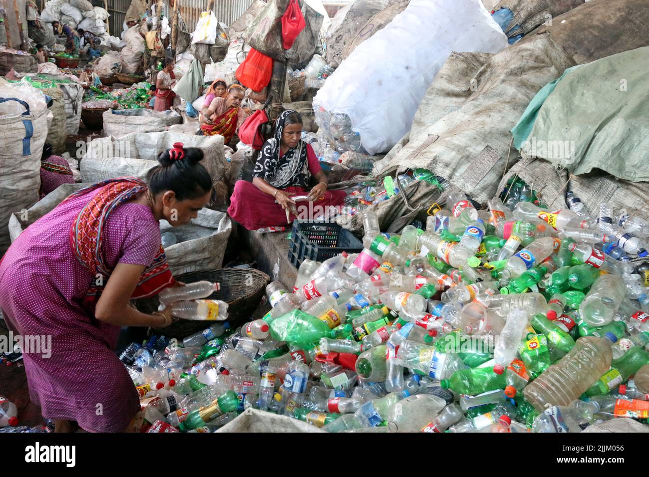 Works Work in a plastic bottle recycling factory in Dhaka, Bangladesh
