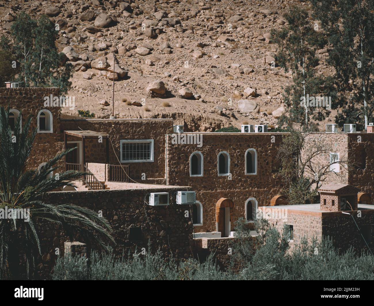 An old fortress with a background of a hill with big rocks Stock Photo