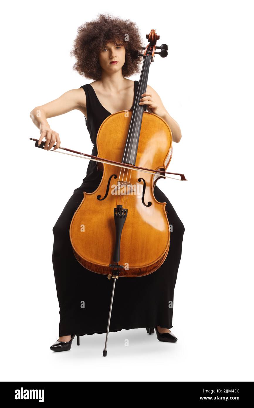Woman in a black dress sitting on a chair and playing a cello isolated on white background Stock Photo