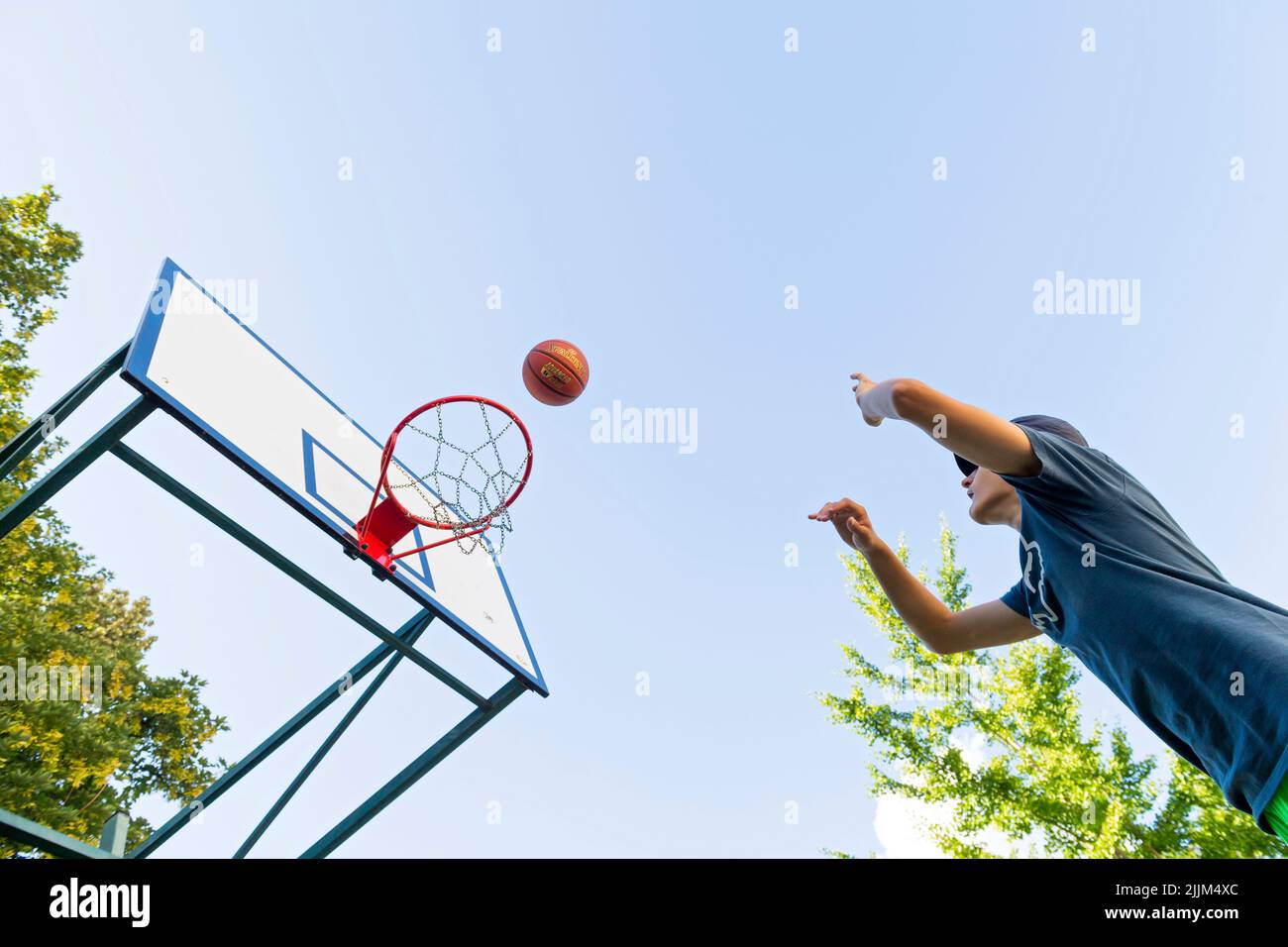 boy playing basketball outdoor Stock Photo Alamy