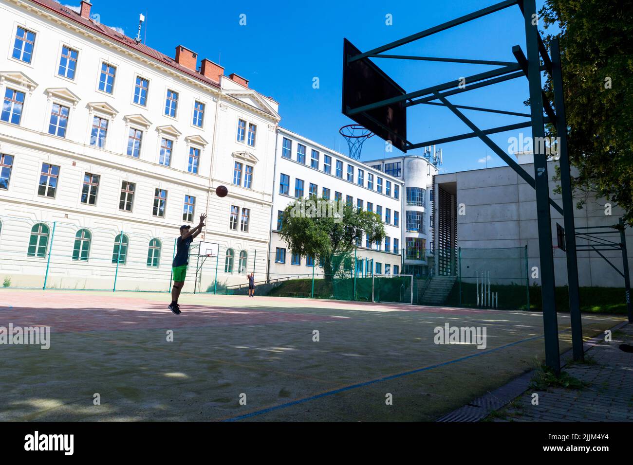 shoting basketball player outdoor Stock Photo