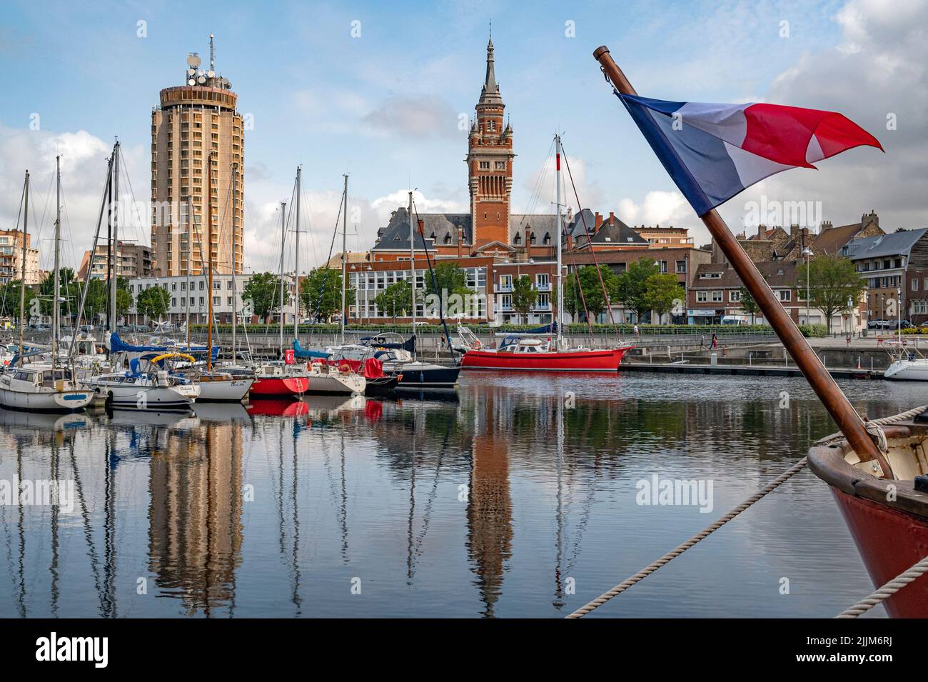 The  tour du Reuze (left) and belfry of the town hall (rigth) seen from the port, Dunkerque, France Stock Photo