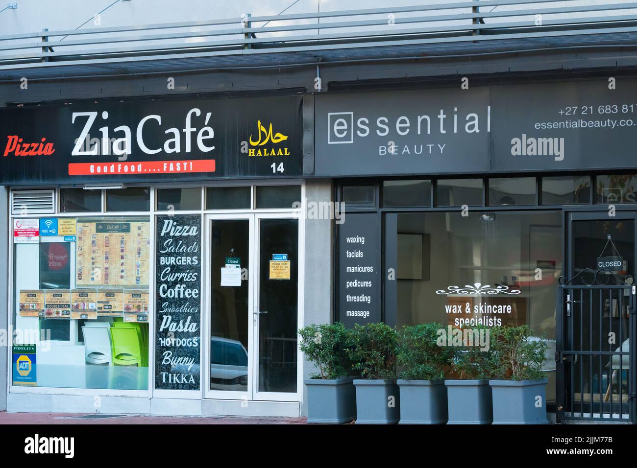 shops, stores, storefronts closed and closeup in an urban environment concept small business in Cape Town, South Africa Stock Photo