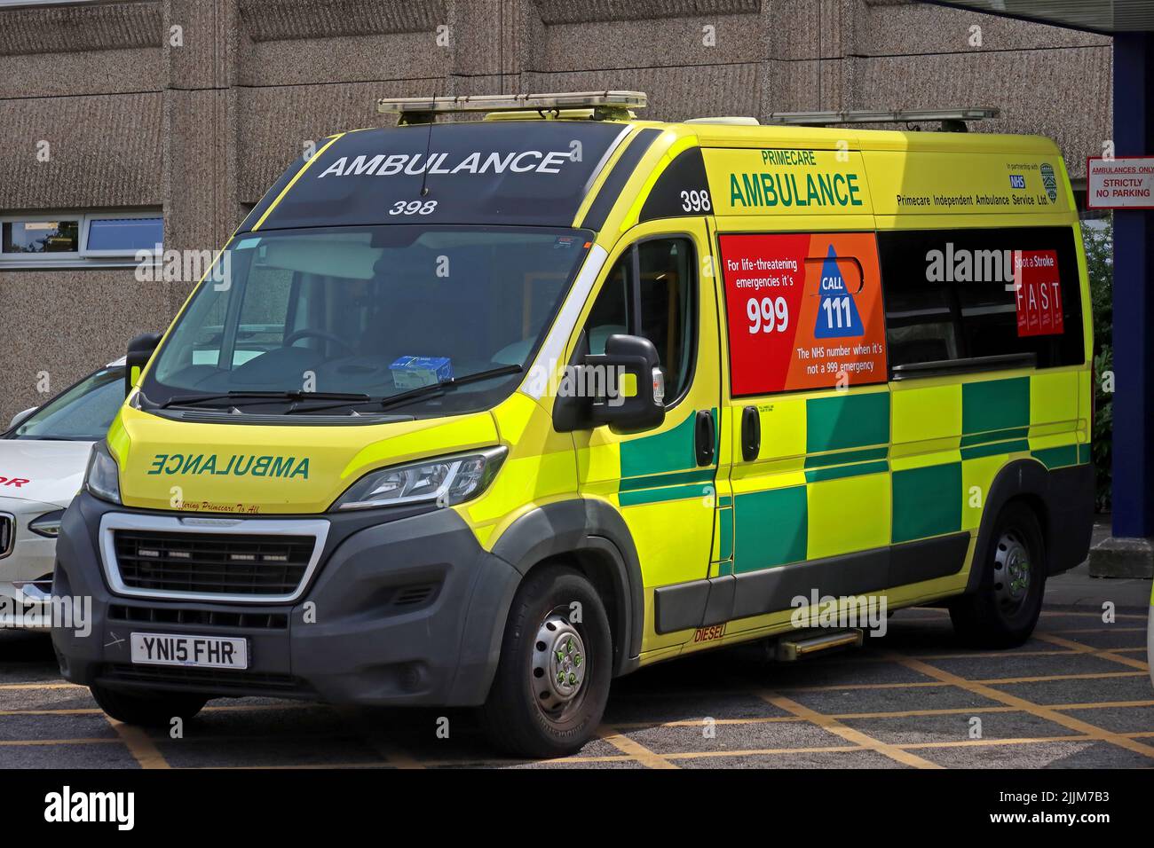 Primecare Ambulance, working with NHS, at Warrington hospital, Lovely Lane, Warrington, Cheshire, England, UK, WA5 1QG Stock Photo