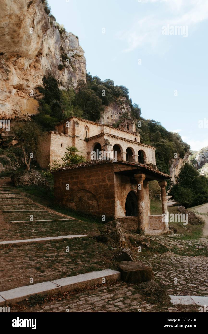 A vertical shot of the monastery of Santa Maria de la Hoz on a mountain in Tobera, Spain Stock Photo