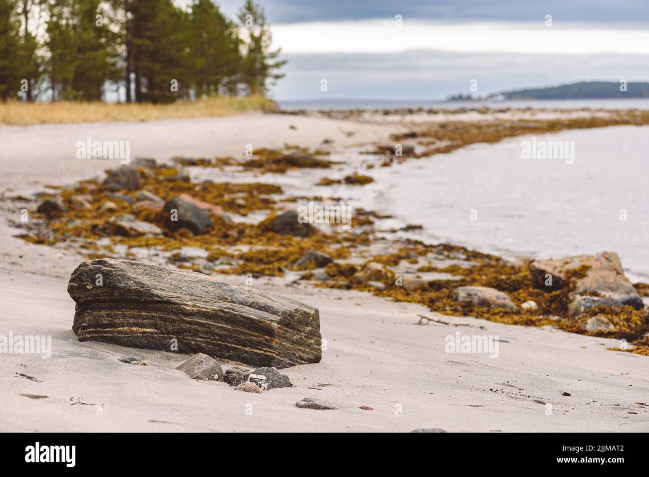 Calm place for meditation and observation on shore of White Sea in Karelia on Fall day Stock Photo