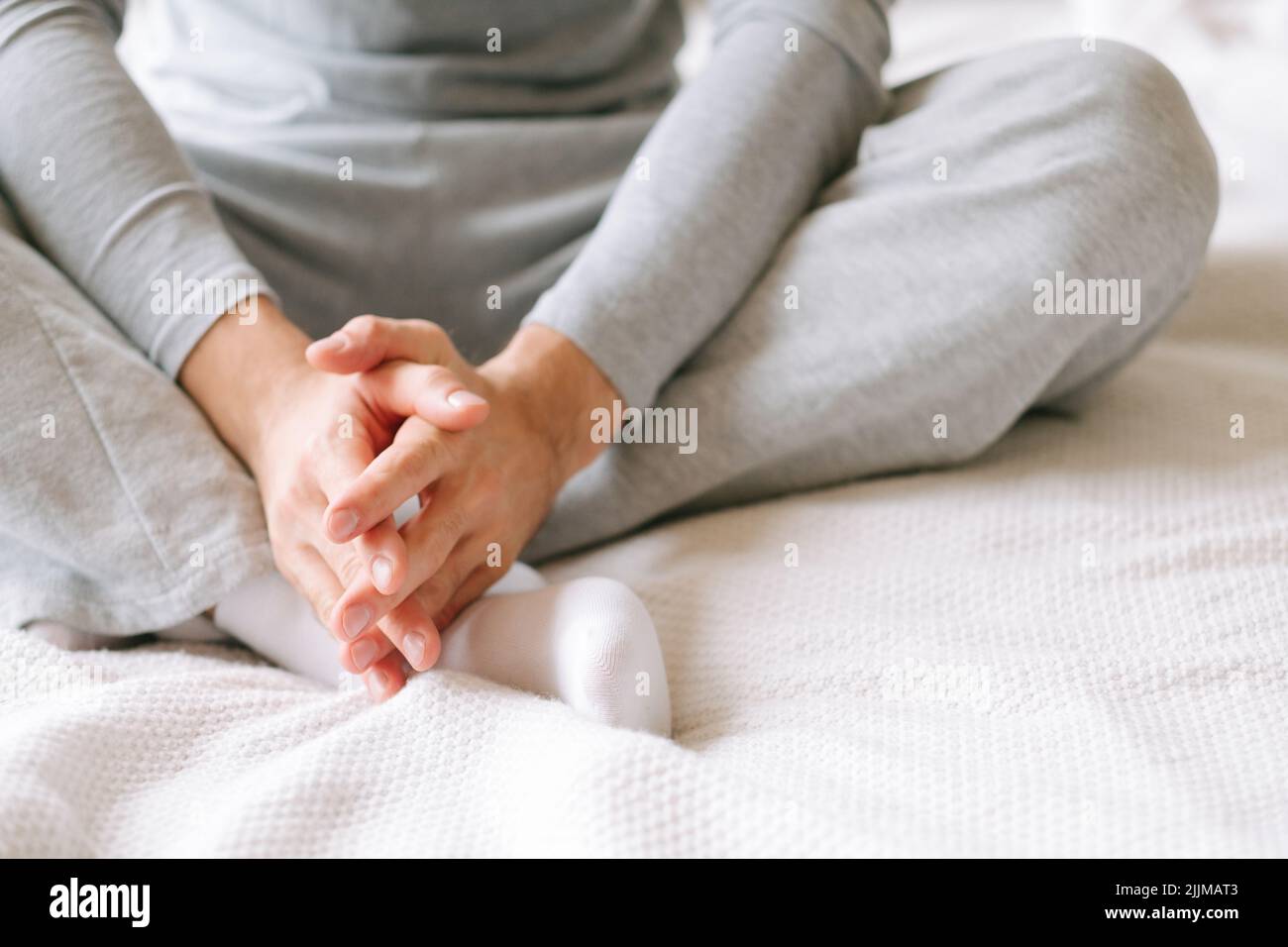 morning day coziness man pyjamas bed thinking Stock Photo