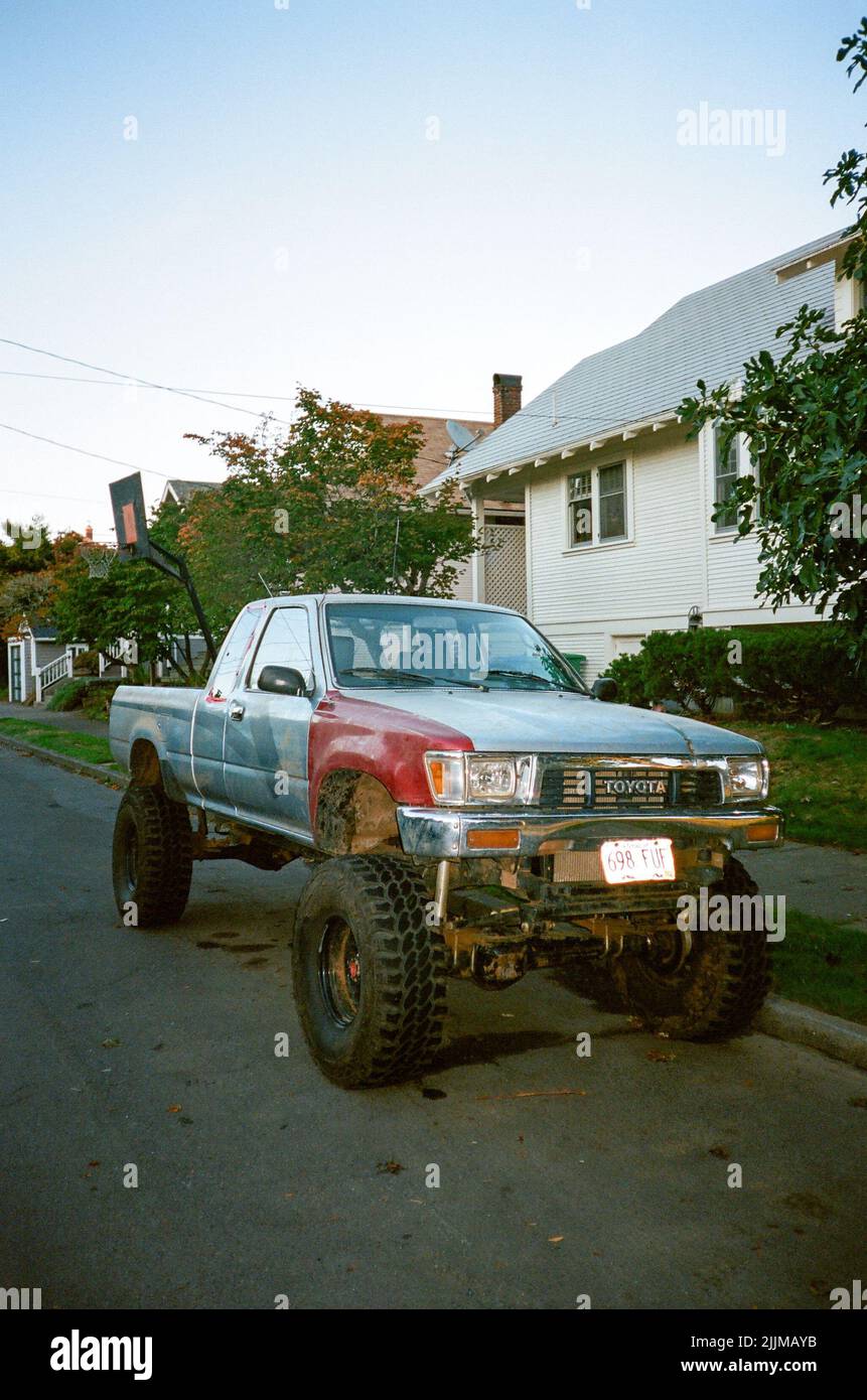 A vertical shot of a modified vintage Toyota pick up truck in Portland Stock Photo