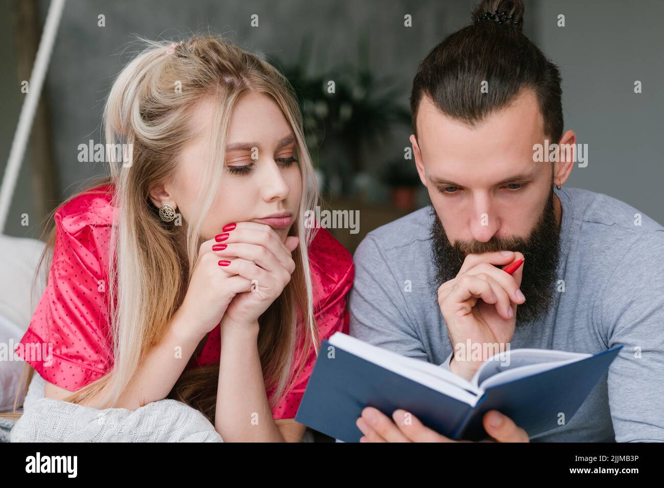 family morning day planning man woman notes Stock Photo