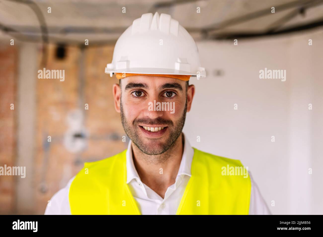 Portrait of confident male architect at construction building site Stock Photo