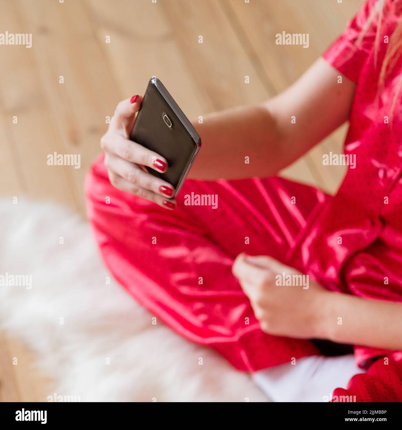 smartphone addiction woman pyjamas take selfie Stock Photo