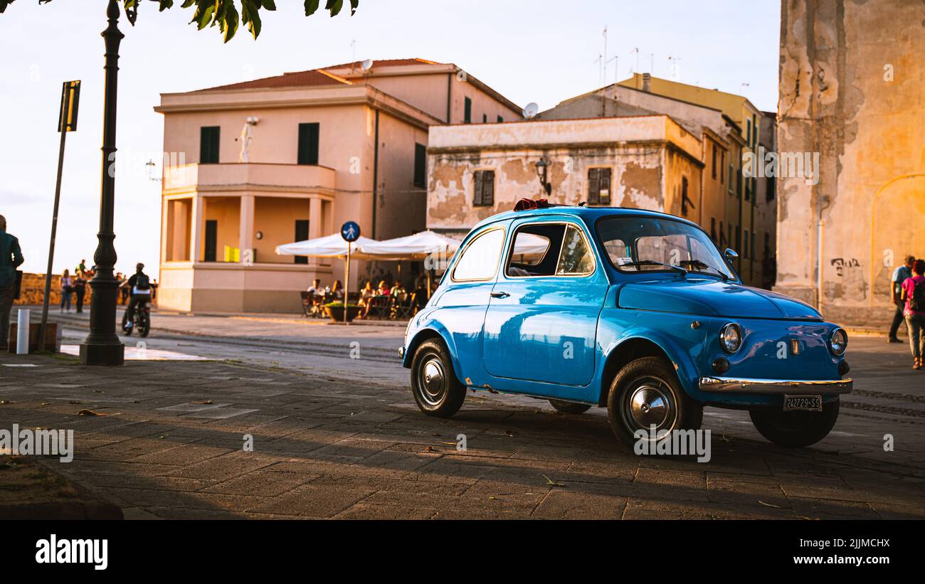 An old fiat 500 parked in Alghero, Italy Stock Photo - Alamy
