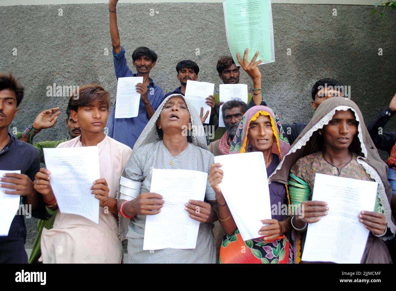 Residents of Matli are holding protest demonstration against high handedness of influent people, at Hyderabad press club on Wednesday, July 27, 2022. Stock Photo