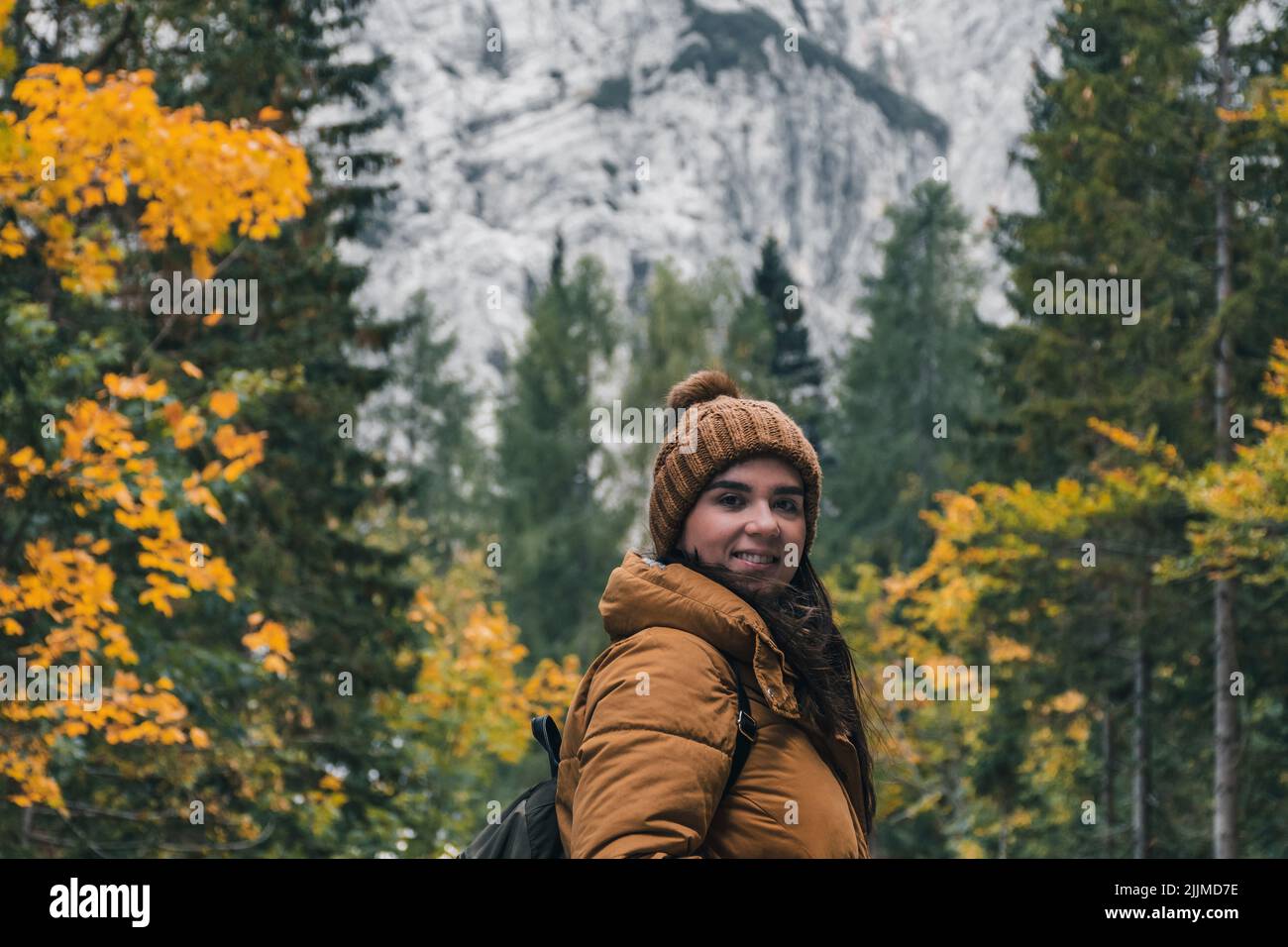 A female Caucasian hiker on the Vrsic mountain pass road in the Julian Alps in Slovenia Stock Photo