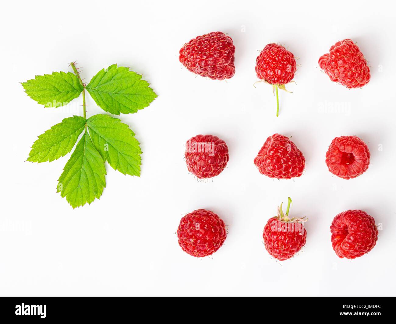 Small Rasperry Fruit Isolated berries. Bunch of raspberry fruits with leaves isolated on ...