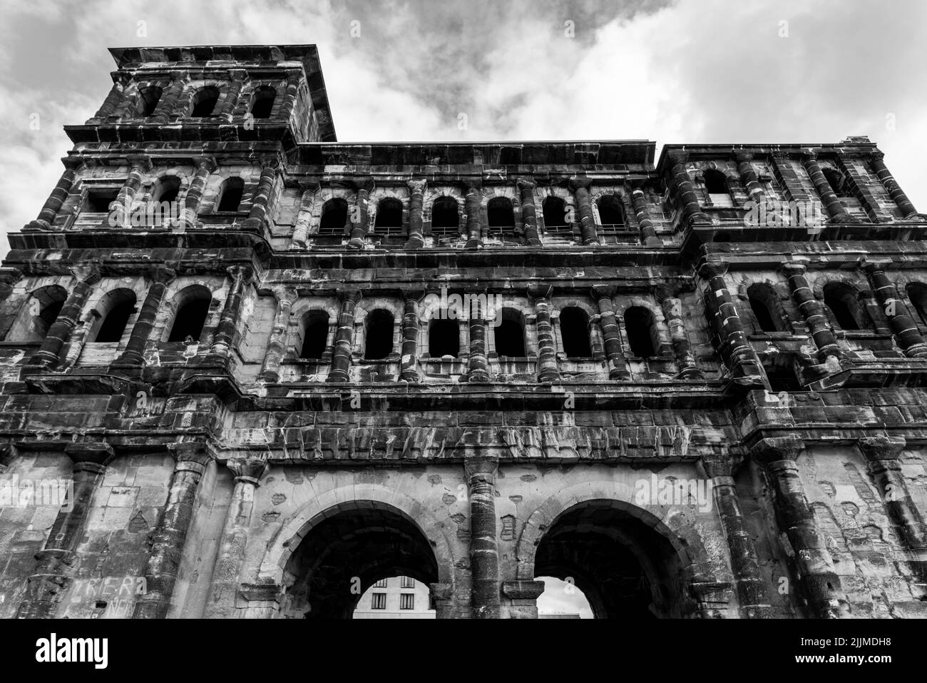 A low angle grayscale shot of the Black Gate (Porta Martis), a large ...