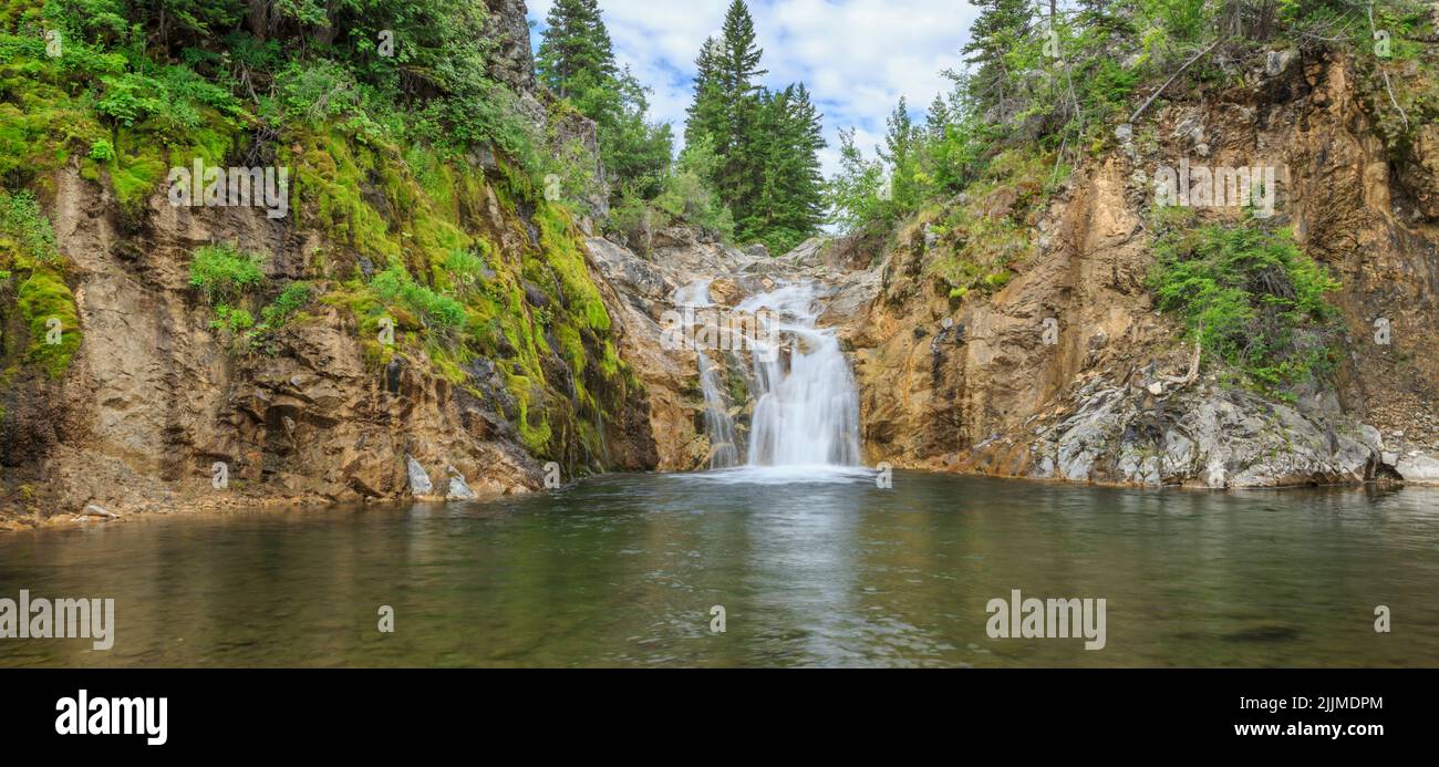 panorama of smith creek falls in lewis and clark national forest near augusta, montana Stock Photo