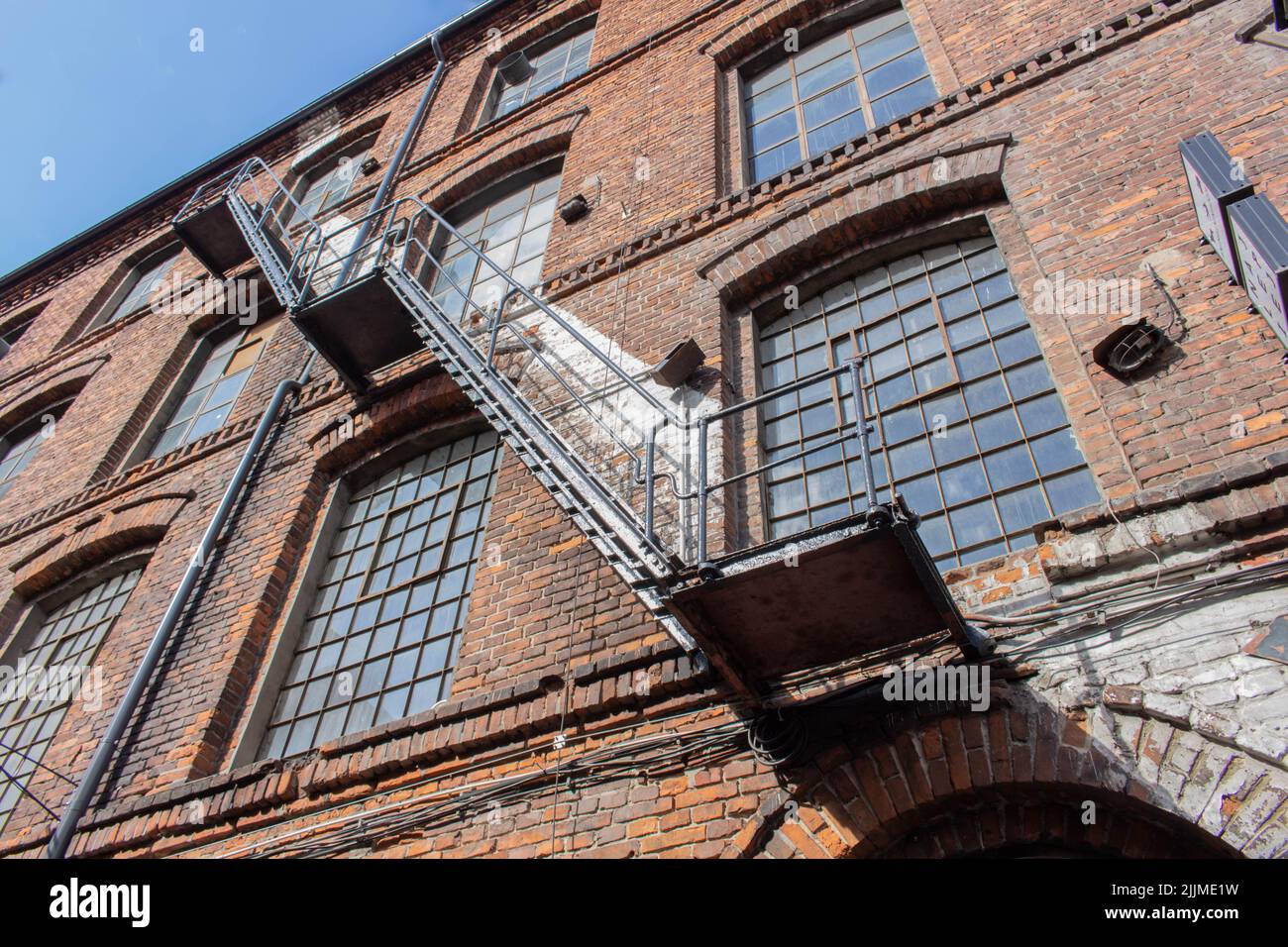 A low angle of an exit staircase of an old building Stock Photo