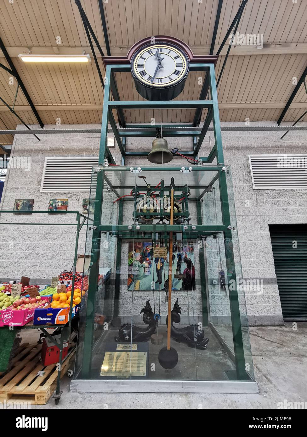 A low angle shot of an old clock in St.Georges market in Belfast Stock Photo