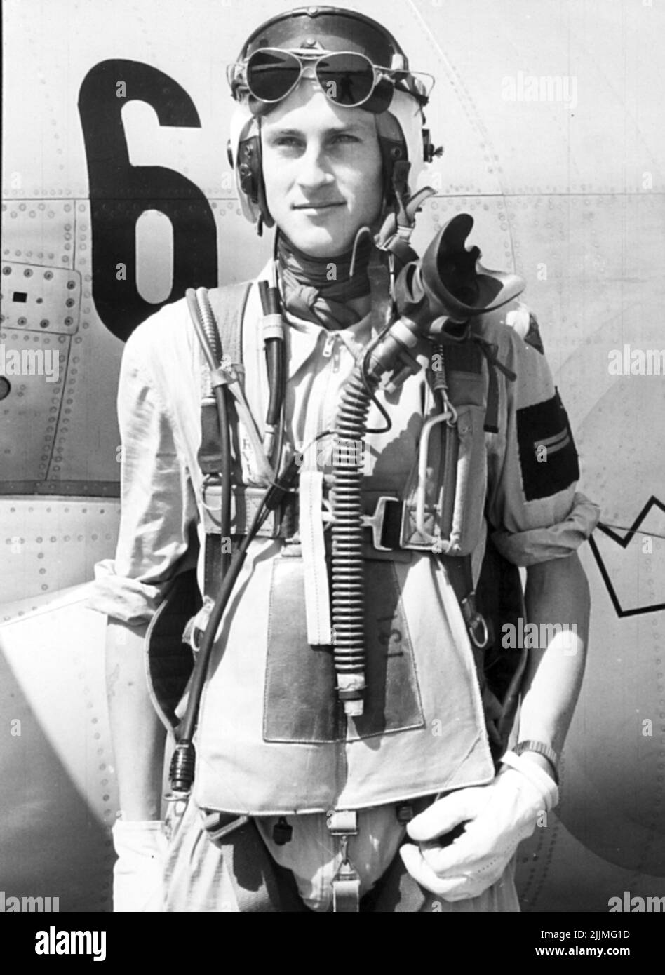 F6 Karlsborg 1956. Field pilot Nils Arne Nilsson dressed in the G-suit closest to the body and summer flight. Aircraft F6 A29 in the background. Stock Photo