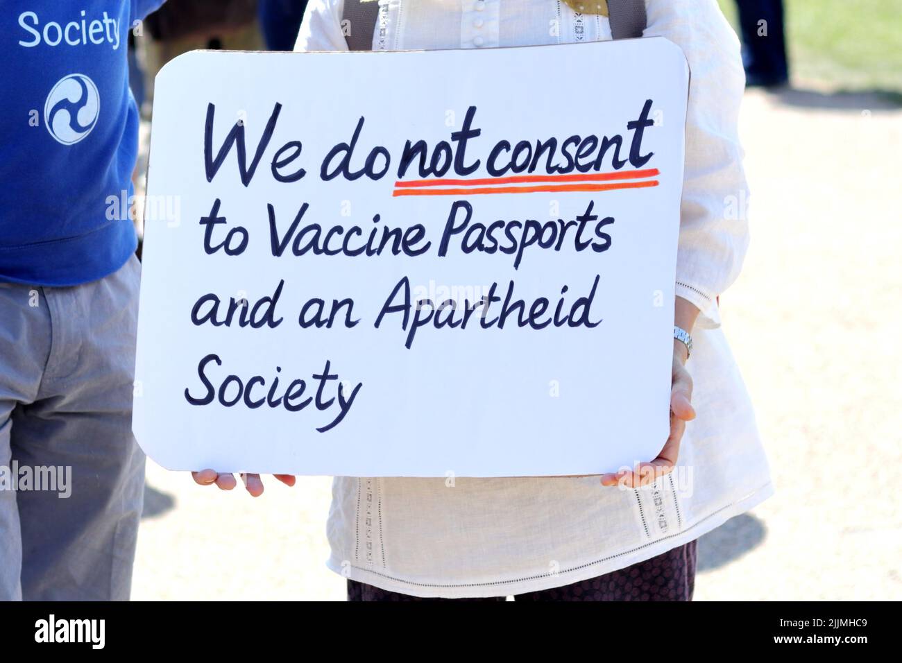 London, UK - April 24, 2021: 'Unite for Freedom' protest by covid-19 sceptics, demonstrators opposing lockdown, vaccination, mask-wearing, etc. Stock Photo